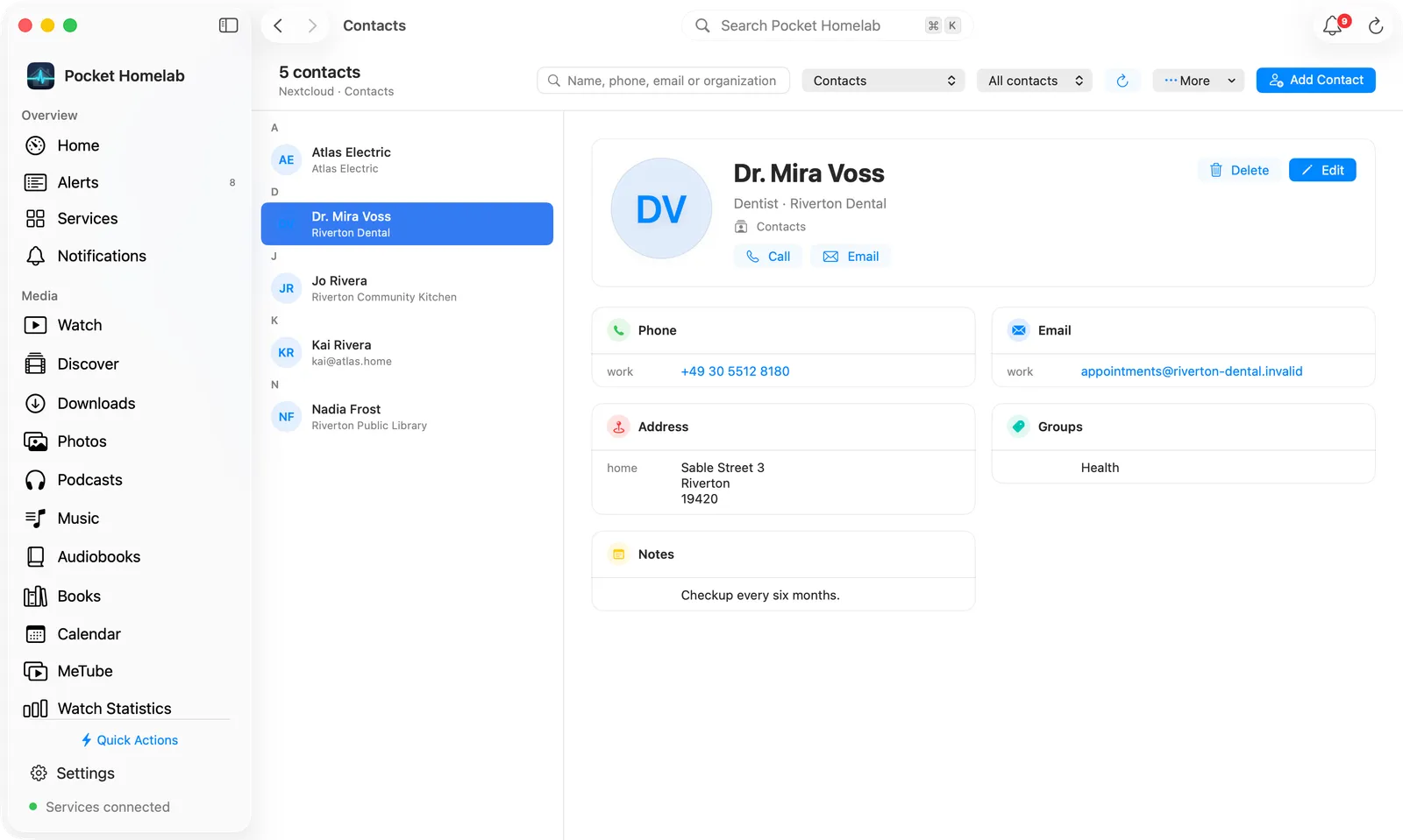 Mac Contacts page with the contacts by letter on the left and a contact card page on the right