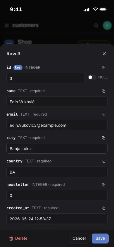Editing a customer row on an iPhone: name, email, city, country and date fields with Save and Delete