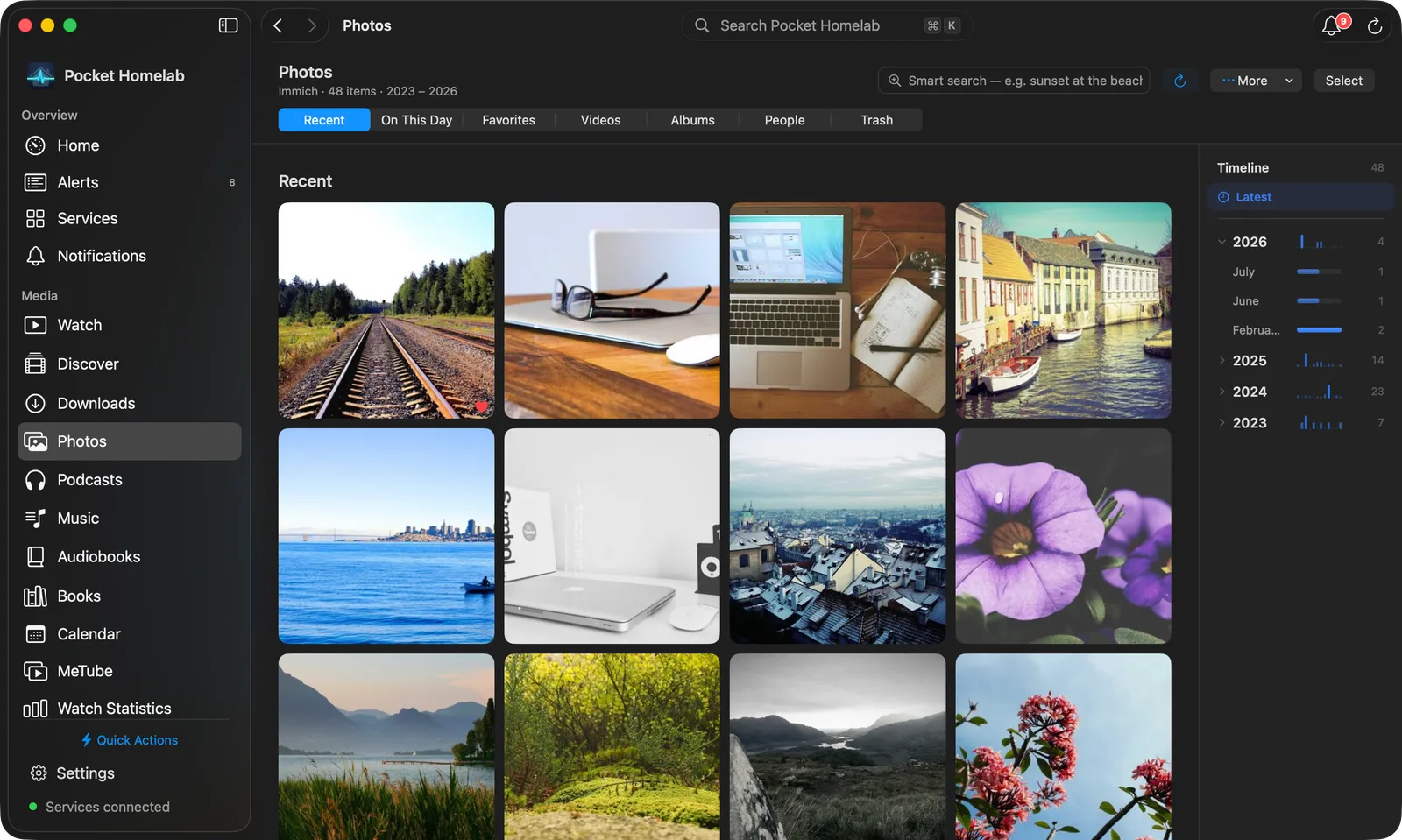 Mac Photos with the two-row bar, the photo grid and the timeline on the right