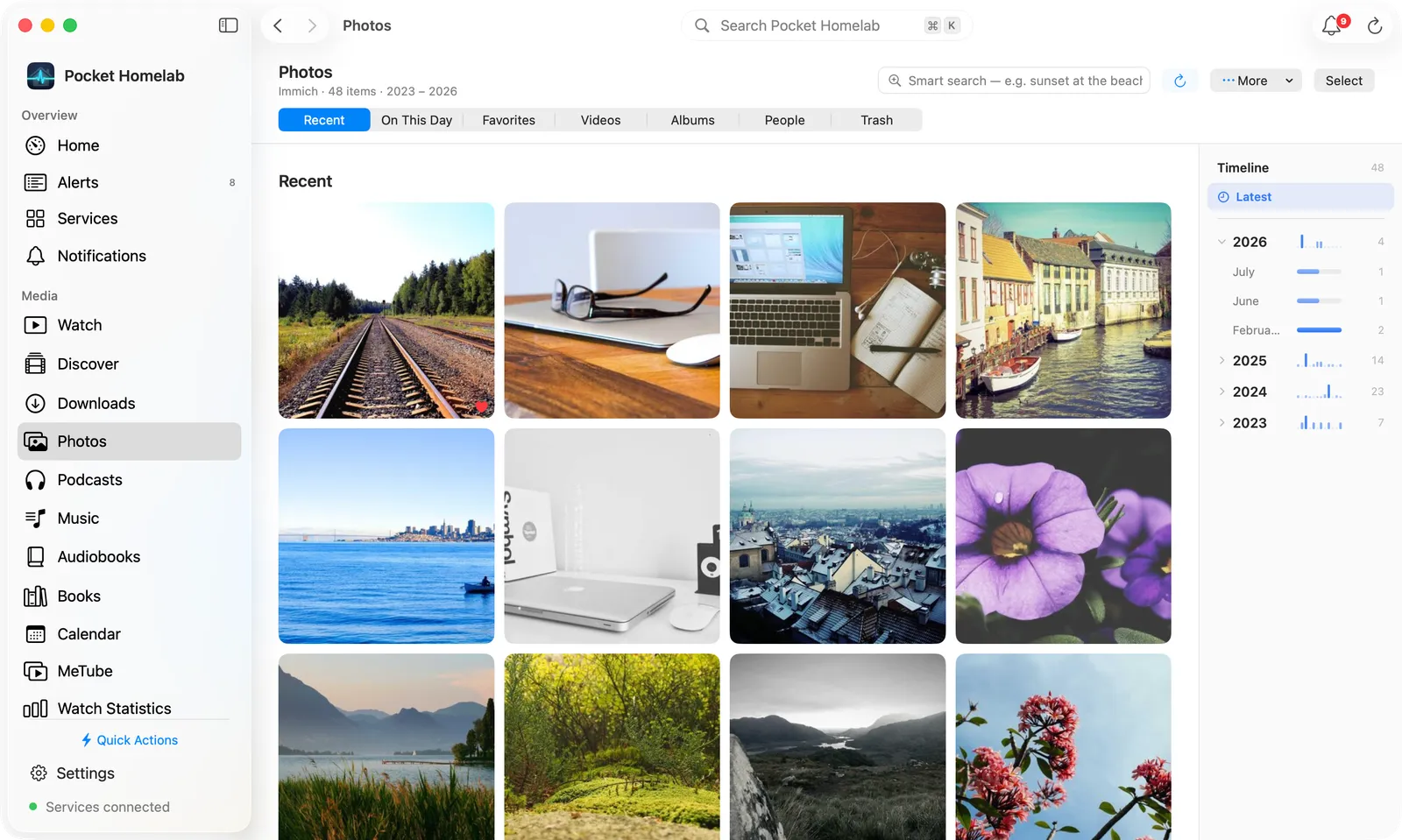 Mac Photos with the two-row bar, the photo grid and the timeline on the right