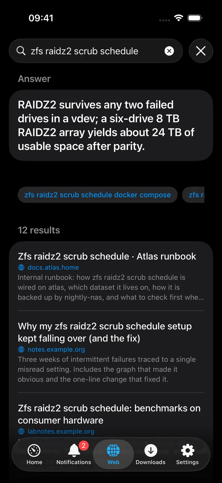 Web screen with an answer, suggestion chips and results.