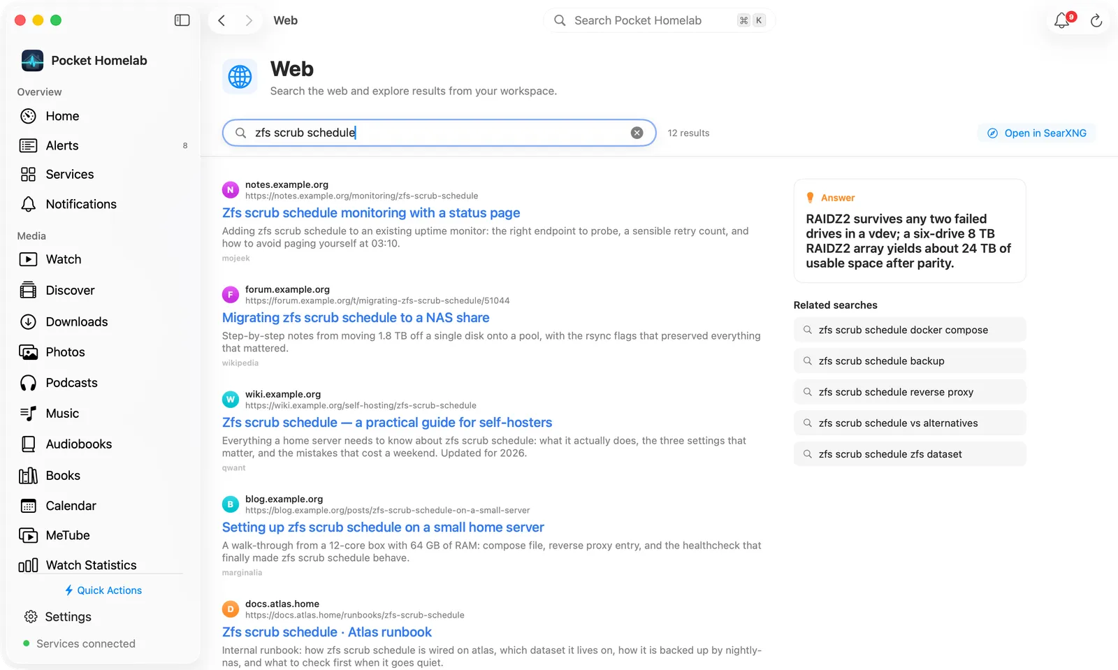 Mac Web page with results in a column, an answer card and related searches beside them
